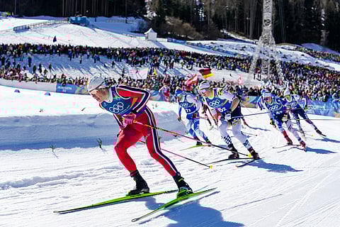 Johannes Hoesflot Klaebo, of Norway, competes in the cross-country skiing men's team sprint free at the 2026 Winter Olympics, in Tesero, Italy.