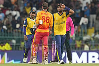 Sri Lanka Vs Zimbabwe, ICC T20 World Cup 2026: Chevrons Stun Co-Hosts By Six Wickets To Top Group B | Photo: AP/Eranga Jayawardena : Sri Lanka's captain Dasun Shanaka, right, congratulate Zimbabwe's Brian Bennett after Zimbabwe won the T20 World Cup cricket match in Colombo, Sri Lanka.