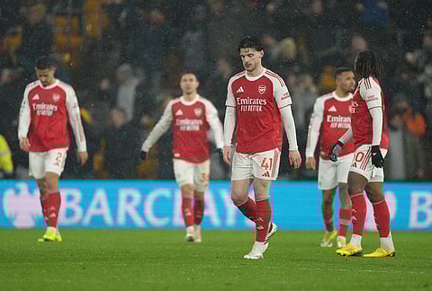 Arsenal team react during the Premier League soccer match between Wolverhampton Wanderers and Arsenal in Wolverhampton, England.