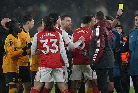 Wolverhampton Wanderers' players argue with Arsenal during the Premier League soccer match between Wolverhampton Wanderers and Arsenal in Wolverhampton, England.