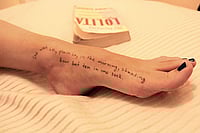 Writing With Fire: Literature In A Post-Epstein World | Photo: Imago/Zuma Press Wire : Image from the Epstein Files: A photo of a woman’s foot with a quote from Vladimir Nabokov’s novel Lolita