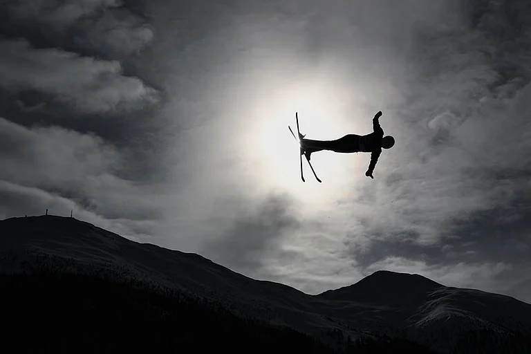 Czechia's Adela Merkova (22) competes during the women's freestyle skiing aerials qualifications at the 2026 Winter Olympics, in Livigno, Italy. - | Photo: AP/Gabriele Facciotti
