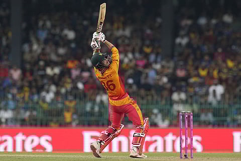 Zimbabwe's Brian Bennett plays a shot during the T20 World Cup cricket match between Sri Lanka and Zimbabwe in Colombo, Sri Lanka.