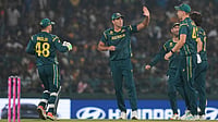 AP : Australia's players celebrate the wicket of Sri Lanka's Kusal Perera during their T20 World Cup match in Pallekele.