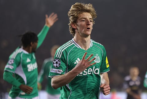 Newcastle's Anthony Gordon celebrates after scoring his fourth goal during the Champions League play-off first leg soccer match between Qarabag and Newcastle in Baku, Azerbaijan.