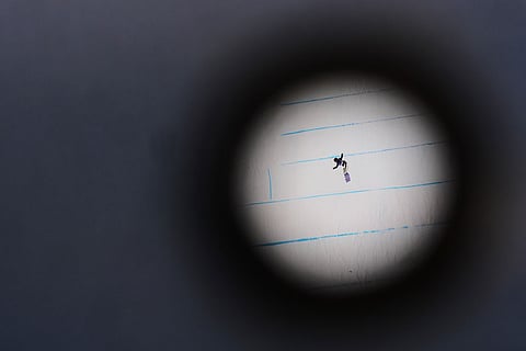 Japan's Reira Iwabuchi competes during the women's snowboarding slopestyle finals at the 2026 Winter Olympics, in Livigno, Italy.