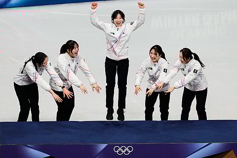 Team South Korea receives their gold medals during the short track speed skating women's team 3000m relay at the 2026 Winter Olympics, in Milan, Italy.