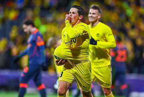 Bodø/Glimt's Sondre Brunstad Fet celebrates after scoring against Inter's Milan during a Champions League soccer match in Bodo, Norway.