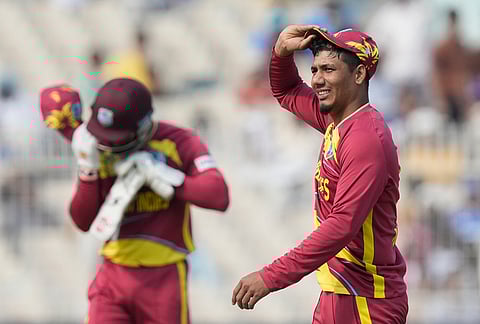 West Indies' Shamar Joseph celebrates the wicket of Italy's Grant Stewart during the T20 World Cup cricket match between West Indies and Italy in Kolkata.