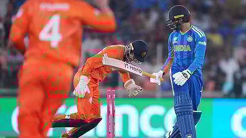 India's Abhishek Sharma, right, reacts after getting bowled out by Netherlands' Aryan Dutt during the T20 World Cup cricket match between India and Netherlands in Ahmedabad.