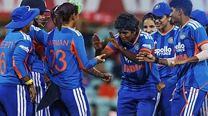 Photo: BCCIWomen/X : Team India cricketers celebrating a wicket against Australia in the 1st T20I at the Sydney Cricket Ground.