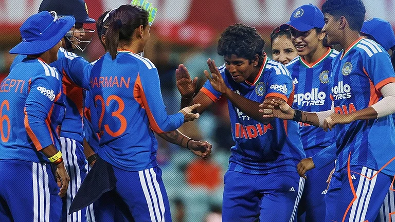 Team India cricketers celebrating a wicket against Australia in the 1st T20I at the Sydney Cricket Ground. - BCCIWomen/X