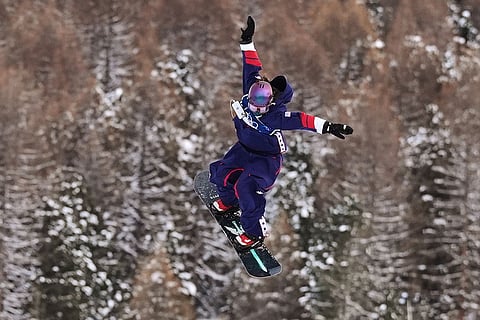 United States' Jessica Perlmutter loses her phone as she competes during the women's snowboarding slopestyle finals at the 2026 Winter Olympics, in Livigno, Italy.
