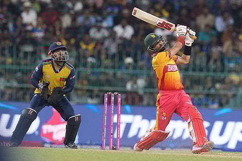 Zimbabwe's captain Sikandar Raza plays a shot during the T20 World Cup cricket match between Sri Lanka and Zimbabwe in Colombo, Sri Lanka.
