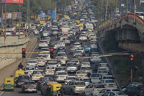 Vehicles stuck in traffic jam on the Indraprastha road, near Bharat Mandapam amid the ongoing AI Impact Summit, in New Delhi.