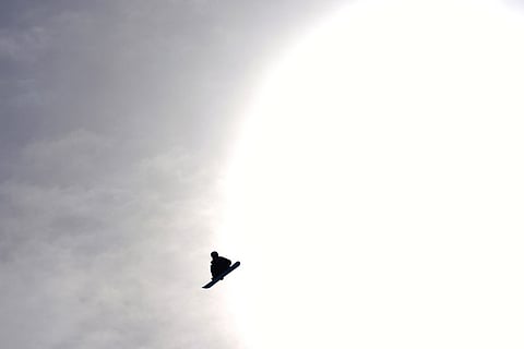 United States' Jake Canter practices before the men's snowboarding slopestyle finals at the 2026 Winter Olympics, in Livigno, Italy.