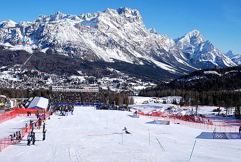 United States' Mikaela Shiffrin speeds down the course to win an alpine ski, women's slalom race, at the 2026 Winter Olympics, in Cortina d'Ampezzo, Italy.