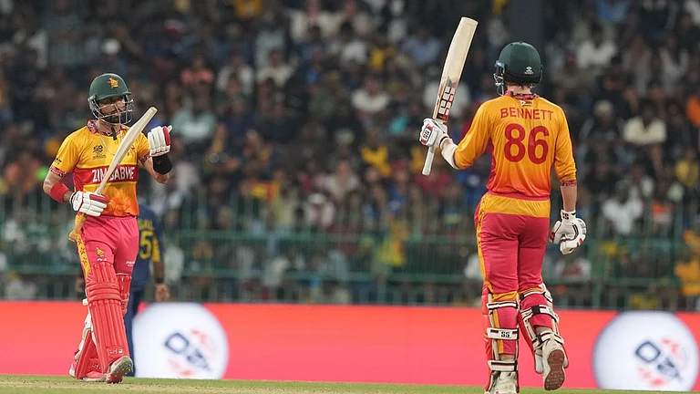 Zimbabwe's Brian Bennett, right, celebrates his fifty runs during the T20 World Cup cricket match between Sri Lanka and Zimbabwe in Colombo, Sri Lanka, Thursday, Feb. 19, 2026. - AP Photo/Eranga Jayawardena