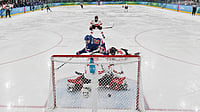 Alexander Nemenov/Pool Photo via AP : United States' Megan Keller (5) scores the winning goal during the women's ice hockey gold medal game between the United States and Canada at the 2026 Winter Olympics, in Milan, Italy, Thursday, Feb. 19, 2026. 