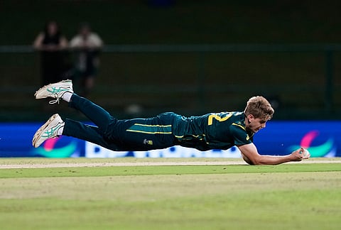 Australia's Cameron Green fields the ball during the T20 World Cup cricket match between Australia and Oman in Pallekele, Sri Lanka.