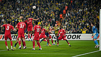 (AP Photo/Emrah Gurel) : Nottingham Forest's Murillo, center, defends a high ball during a Europa league play-off first leg soccer match between Fenerbahce and Nottingham Forest in Istanbul, Turkey, Thursday, Feb. 19, 2026. 
