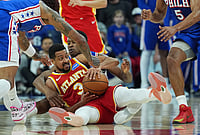 Philadelphia 76ers Vs Atlanta Hawks: Who Won The Teams' First NBA Game After The All-Star Break? | Photo: AP/Matt Rourke : Atlanta Hawks' CJ McCollum (3) battles for the ball with Philadelphia 76ers' Vj Edgecombe, back, during the second half of an NBA basketball game in Philadelphia.