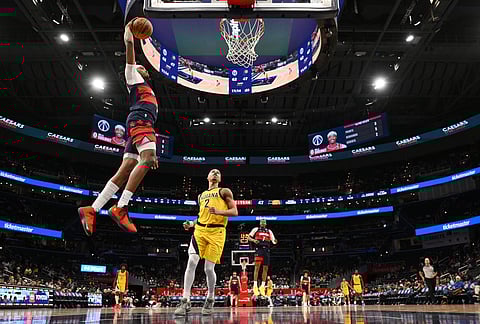 Washington Wizards guard Bilal Coulibaly goes to the basket against Indiana Pacers guard Andrew Nembhard (2) during the second half of an NBA basketball game, in Washington.