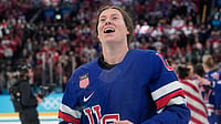 (AP Photo/Hassan Ammar) : United States' Kelly Pannek (12) celebrates after a women's ice hockey gold medal game between the United States and Canada at the 2026 Winter Olympics, in Milan, Italy, Thursday, Feb. 19, 2026