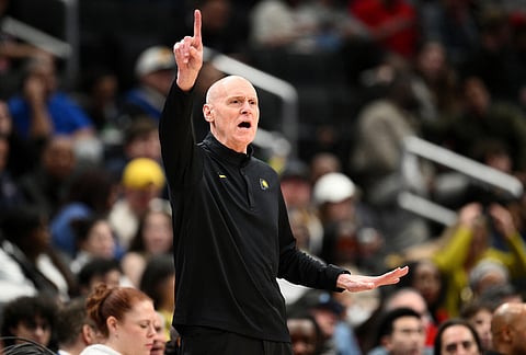 Indiana Pacers head coach Rick Carlisle gestures during the second half of an NBA basketball game against the Washington Wizards, in Washington.
