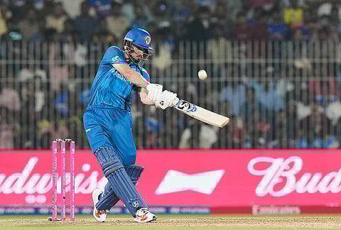Afghanistan's Sediqullah Atal hits a six during the T20 World Cup cricket match between Afghanistan and Canada in Chennai.