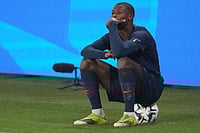 Ligue 1: Ousmane Dembele To Miss Metz Game With Calf Injury, PSG Sweating On Fitness For Monaco | Photo: AP/Thibault Camus : PSG's Ousmane Dembele reacts during the French League One soccer match between Paris Saint-Germain and Marseille in Paris, Sunday, Feb. 8, 2026.