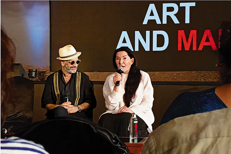 Marina Abramović with Kochi-Muziris Biennale curator Nikhil Chopra during a press interaction