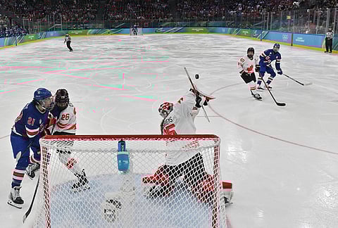Canada's goalie Ann-Renee Desbiens defends during the women's ice hockey gold medal game between the United States and Canada at the 2026 Winter Olympics, in Milan, Italy.