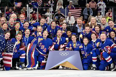 United States' team celebrate after victory ceremony for women's ice hockey at the 2026 Winter Olympics, in Milan, Italy, Thursday, Feb. 19, 2026.