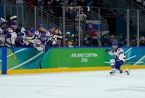 United States' Jack Hughes (86) celebrates after scoring his side's third goal during a men's ice hockey semifinal game between United States and Slovakia at the 2026 Winter Olympics, in Milan, Italy.