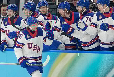 United States' Jack Hughes (86) celebrates after scoring his side's third goal during a men's ice hockey semifinal game between the United States and Slovakia at the 2026 Winter Olympics, in Milan, Italy.