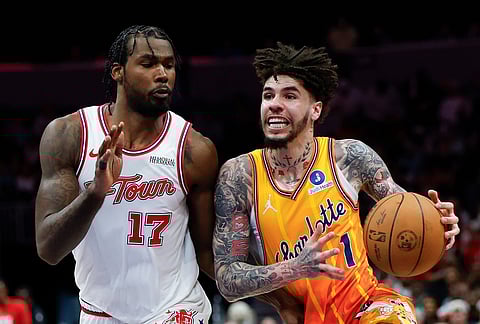 Charlotte Hornets guard LaMelo Ball (1) drives against Houston Rockets forward Tari Eason (17) during the second half of an NBA basketball game in Charlotte, North Carolina.