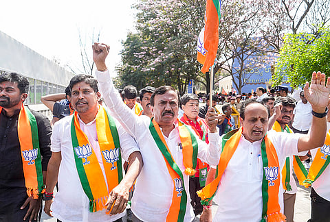 Bharatiya Janata Yuva Morcha (BJYM) activists during a protest against Congress over Youth Congress workers' shirtless disruption at the AI Impact Summit, in Bengaluru.