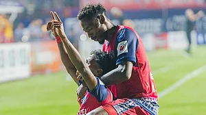 IndSuperLeague/X : Jamshedpur FC players and Vincy Barreto celebrating a goal against Punjab FC in ISL 2025-26.