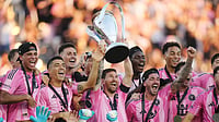 LAFC Vs Inter Miami Live Streaming, MLS 2026: When, Where To Watch Lionel Messi In Action | Photo: AP/DARRYL DYCK : Inter Miami's Lionel Messi hoists the trophy alongside teammates after defeating the Vancouver Whitecaps in the MLS Cup final soccer match, in Fort Lauderdale, Fla., Saturday, Dec. 6, 2025.