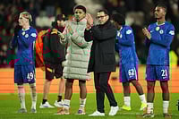 | Photo: AP/Jon Super : Chelsea players thank the fans after the Champions League match between Liverpool and Real Madrid in Liverpool, England, Tuesday, Nov. 4, 2025. 