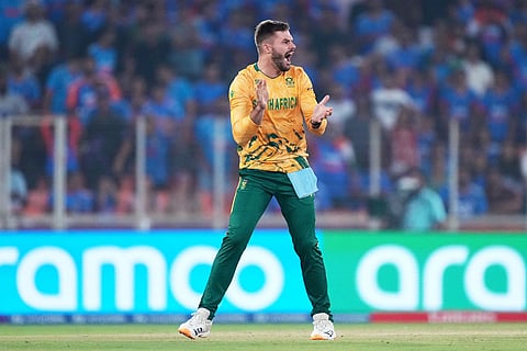 South Africa's captain Aiden Markram celebrates the wicket of India's Ishan Kishan during the T20 World Cup cricket match between India and South Africa in Ahmedabad, India.