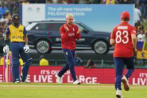 England's Will Jacks, center, celebrates with teammates the wicket of Sri Lanka's Pavan Rathnayake during the T20 World Cup cricket match between Sri Lanka and England in Pallekele, Sri Lanka.