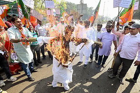 Bharatiya Janata Party (BJP) activists burn an effigy of Leader of Opposition Rahul Gandhi to protest the Youth Congress workers' protest at the AI Impact Summit, in Patna.