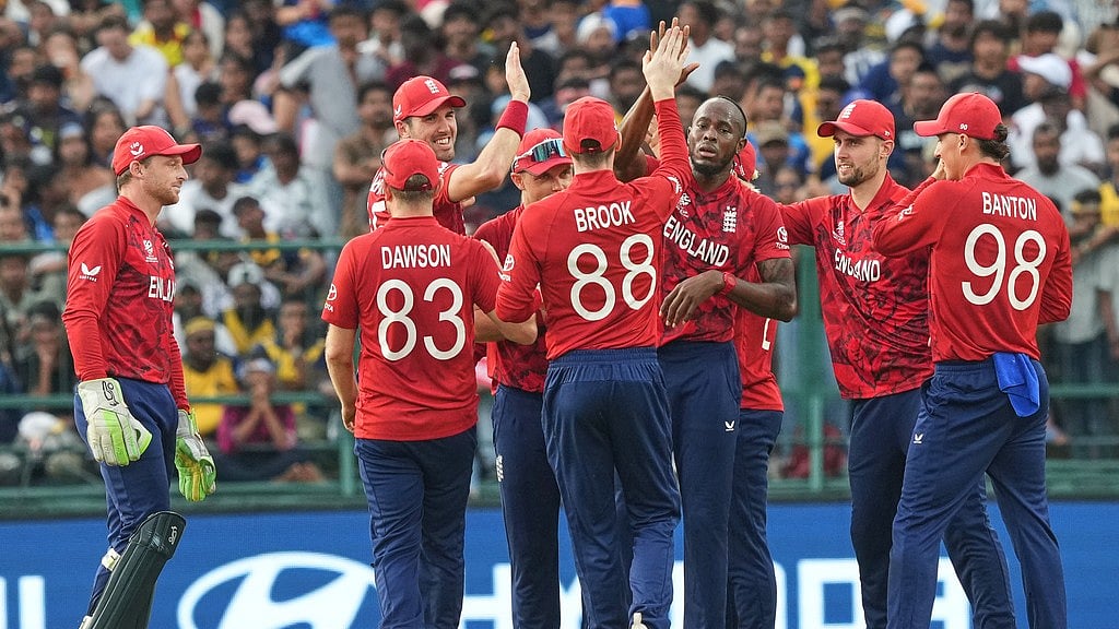 England's Jofra Archer, center without cap, celebrates with teammates the wicket of Sri Lanka's Kamil Mishara during the T20 World Cup cricket match between Sri Lanka and England in Pallekele, Sri Lanka, Sunday, Feb. 22, 2026.  - AP Photo/Eranga Jayawardena