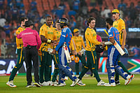 India Vs South Africa, ICC T20 World Cup 2026 Super 8: Proteas Thrash Defending Champions by 76 Runs | Photo: PTI/Arun Sharma : South Africa's players being congratulated by India's Varun Chakravarthy and Jasprit Bumrah after winning the ICC Men's T20 World Cup 2026 cricket match between India and South Africa, at the Narendra Modi Stadium, in Ahmedabad.