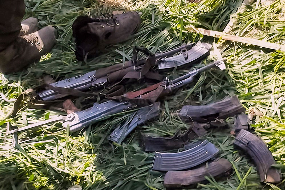 | Photo: PTI : Arms and ammunition recovered from the site of an encounter between security forces and militants, in Kishtwar district, Jammu and Kashmir.