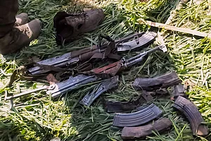 | Photo: PTI : Arms and ammunition recovered from the site of an encounter between security forces and militants, in Kishtwar district, Jammu and Kashmir.