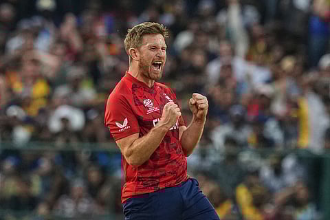 England's Liam Dawson celebrates the wicket of Sri Lanka's Kamindu Mendis during the T20 World Cup cricket match between Sri Lanka and England in Pallekele, Sri Lanka.