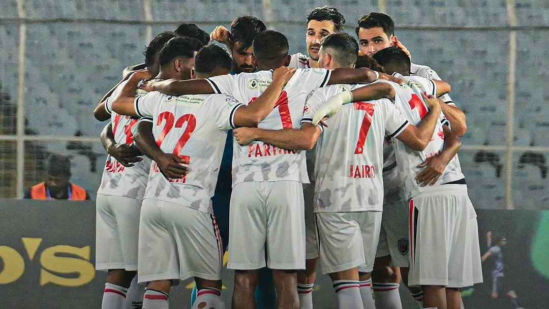 NorthEast United footballers in team huddle against East Bengal in ISL 2025-26.  - NEUtdFC/X